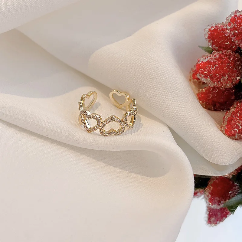 South Korea contracted temperament set drill hollow out love can adjust female ring
South Korea contracted temperament set drill hollow out love can adjust female ring