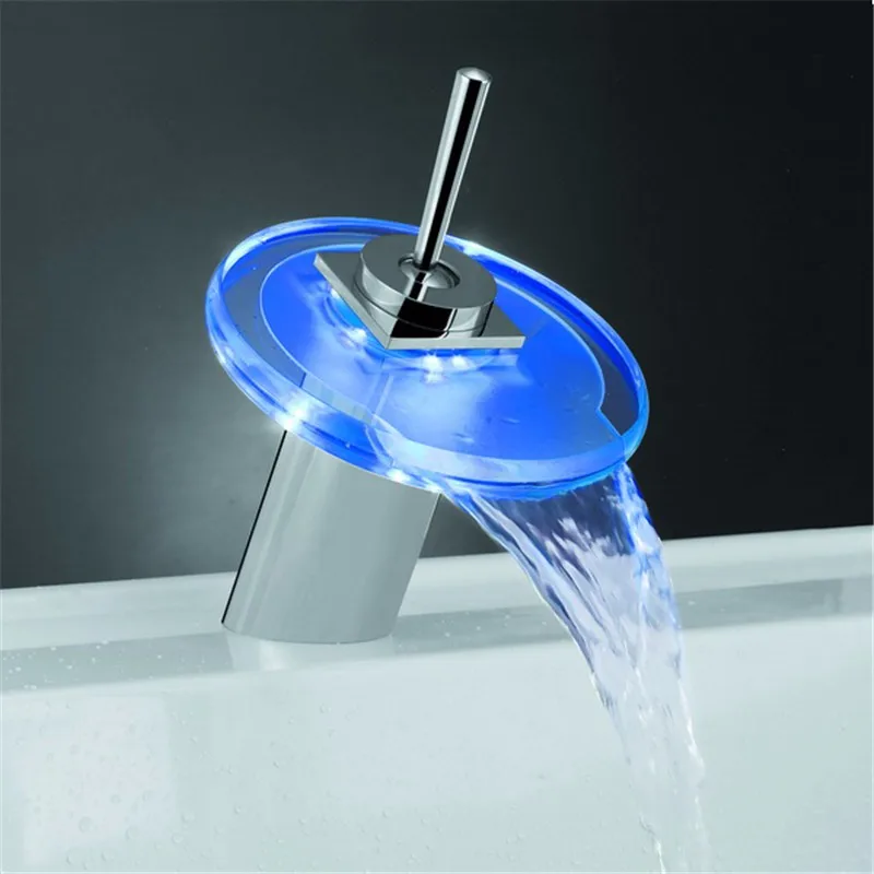 The Round LED Basin Faucet Brass Waterfall Temperature Colors Change Bathroom Mixer Tap Deck Mounted Wash Sink Glass Basin Taps 
The Round LED Basin Faucet Brass Waterfall Temperature Colors Change Bathroom Mixer Tap Deck Mounted Wash Sink Glass Basin Taps