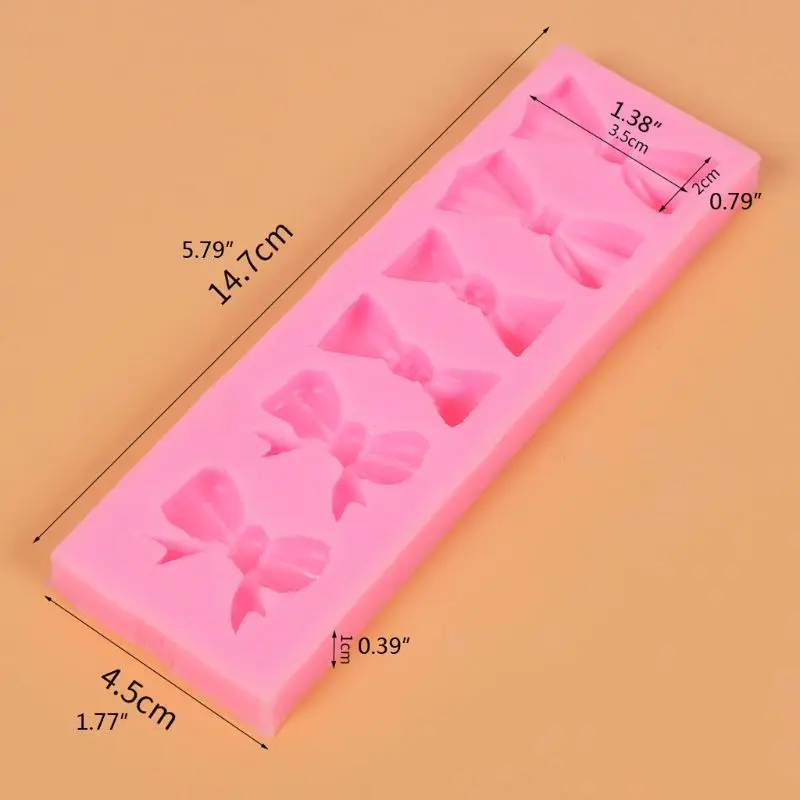Handmade Cute Bowtie Silicone Mold Fondant Sugarcraft Mould Gum Paste Chocolate Resin Cake Mold Jewelry Baking Tools 
Handmade Cute Bowtie Silicone Mold Fondant Sugarcraft Mould Gum Paste Chocolate Resin Cake Mold Jewelry Baking Tools
