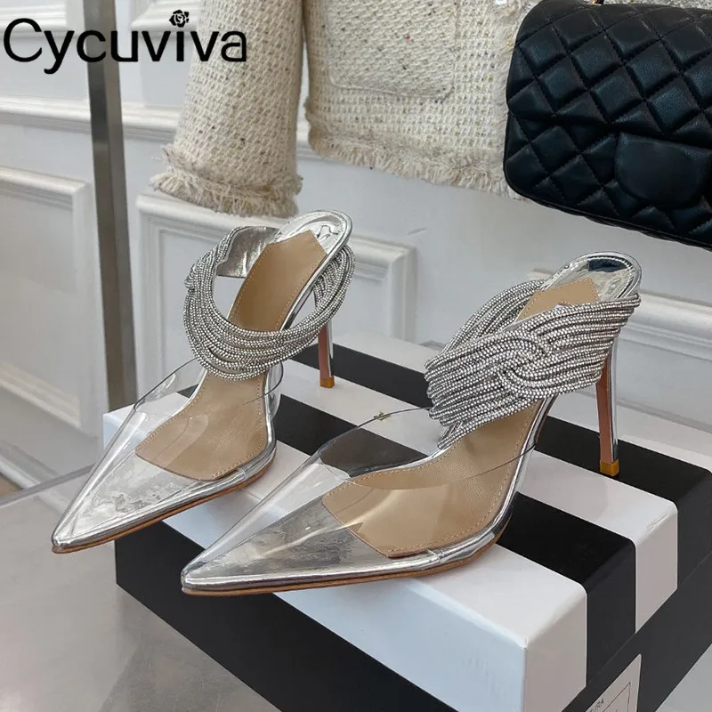 New Glitter Crystal Women Slippers Designer Brand Slides Summer Clear PVC Dress Jelly Shoes Point Toe High Heel Slippers Women
New Glitter Crystal Women Slippers Designer Brand Slides Summer Clear PVC Dress Jelly Shoes Point Toe High Heel Slippers Women
