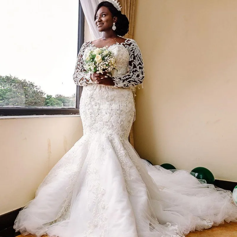 Luxury African Mermaid Wedding Dresses Sheer Neck Beads Plus Size Bridal Dress Aso Ebi Long Sleeves vestido de noiva 
Luxury African Mermaid Wedding Dresses Sheer Neck Beads Plus Size Bridal Dress Aso Ebi Long Sleeves vestido de noiva