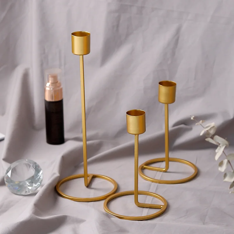New Nordic gold single head wrought iron candlestick Creative romantic table set table wedding decoration ornaments candlestick
New Nordic gold single head wrought iron candlestick Creative romantic table set table wedding decoration ornaments candlestick