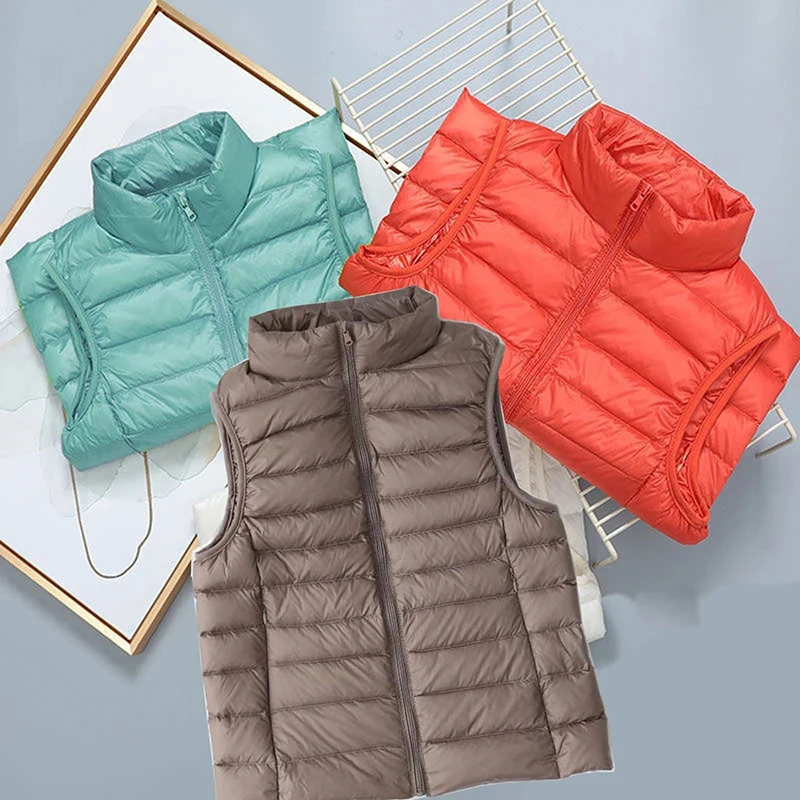 13 Colors Womens Packable Ultra Lightweight Down Vest Puffer Vest 2021 Winter New Stand Collar Thin Sleeveless Portable Jacket
13 Colors Womens Packable Ultra Lightweight Down Vest Puffer Vest 2021 Winter New Stand Collar Thin Sleeveless Portable Jacket