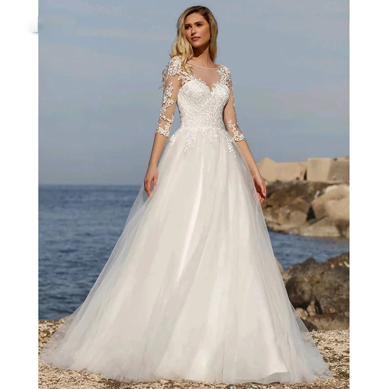 Illusion Beach Wedding Dress Boho vestido de noiva Bohemian Lace Bridal Dress Backless Long Sleeves V Neck Wedding Gowns 2021
Illusion Beach Wedding Dress Boho vestido de noiva Bohemian Lace Bridal Dress Backless Long Sleeves V Neck Wedding Gowns 2021