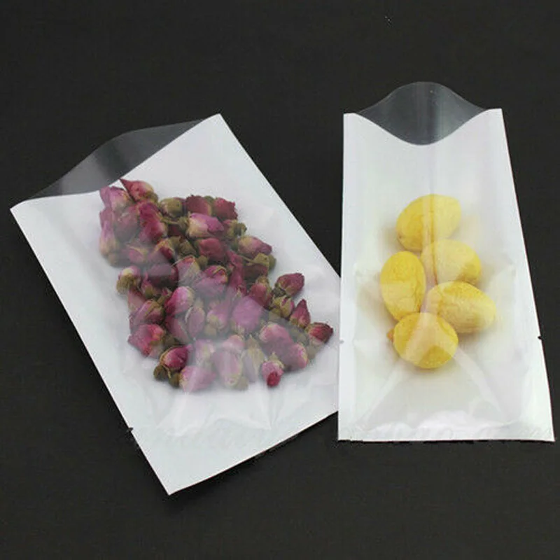 100 PCS/Set Open Top With tear notch White Clear Plastic Bags Vacuum Heat Seal Poly Pouch Food Tea/Nuts Storage Pouches
100 PCS/Set Open Top With tear notch White Clear Plastic Bags Vacuum Heat Seal Poly Pouch Food Tea/Nuts Storage Pouches