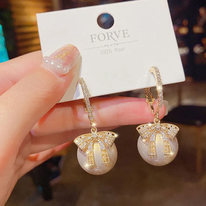 Vintage Charm Fashion Pearl Earrings For Women Long Tassel Zircon Bow Dangle Drop Earrings 2021 Jewelry Gift
Vintage Charm Fashion Pearl Earrings For Women Long Tassel Zircon Bow Dangle Drop Earrings 2021 Jewelry Gift