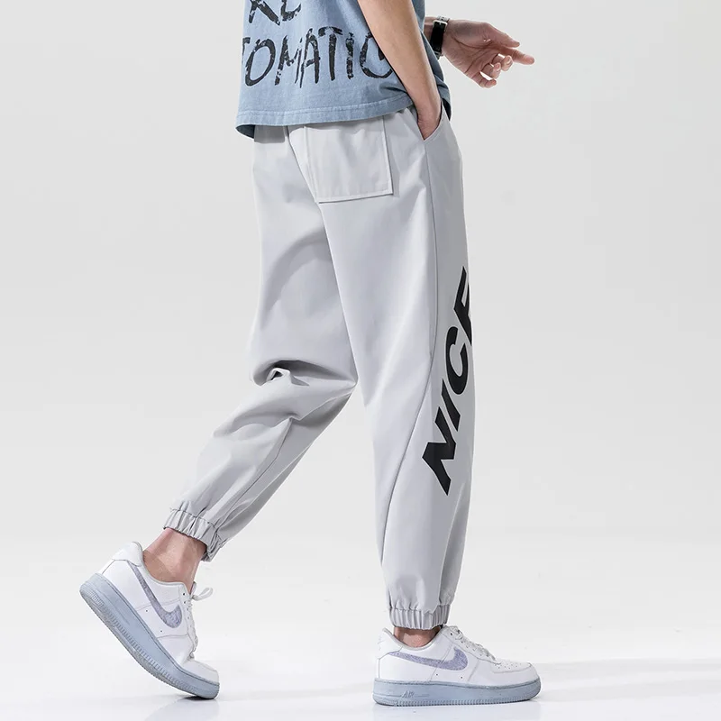 Men Breathable Harem Pants 2021 New Male Fashion Casual Loose Trousers Mens Letter Printting Pockets Sweatpants Spring Autumn 
Men Breathable Harem Pants 2021 New Male Fashion Casual Loose Trousers Mens Letter Printting Pockets Sweatpants Spring Autumn