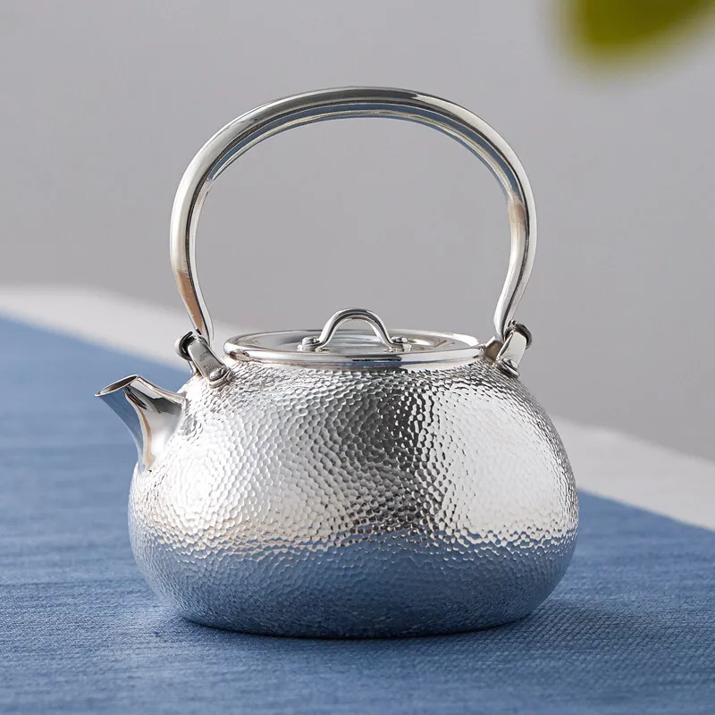 Handmade s999 silver teapot, boiling kettle, kung fu tea set, self use or gift giving, silver pot with hammer lines
Handmade s999 silver teapot, boiling kettle, kung fu tea set, self use or gift giving, silver pot with hammer lines