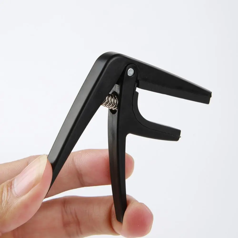 Professional Ukulele Capo 4 Strings Guitar Capos Single-handed Quick Change Ukelele Capo Guitar Parts & Accessories
Professional Ukulele Capo 4 Strings Guitar Capos Single-handed Quick Change Ukelele Capo Guitar Parts & Accessories