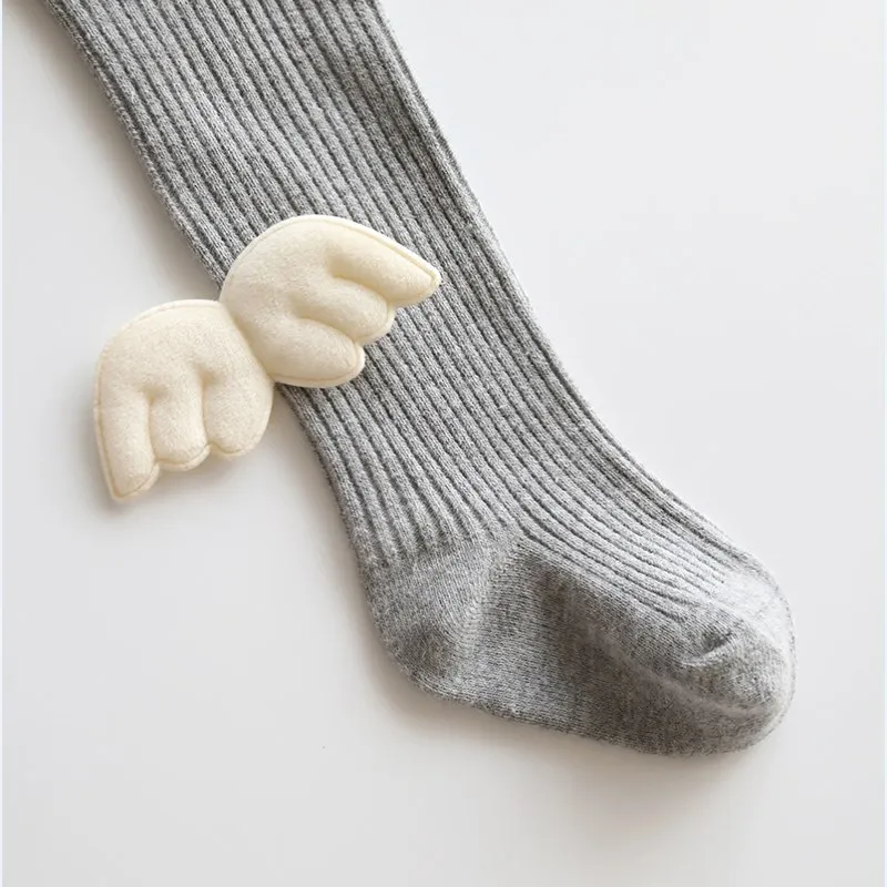 Autumn and winter new style children's pantyhose angel wing girl's pantyhose vertical bar baby socks baby's underpants
Autumn and winter new style children's pantyhose angel wing girl's pantyhose vertical bar baby socks baby's underpants