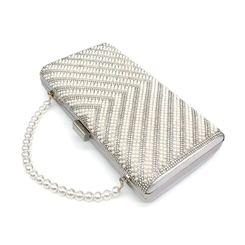 Pearl dinner bag V-shaped diamond wedding banquet hand-held small square box chain bag foreign trade evening dress women's bag
Pearl dinner bag V-shaped diamond wedding banquet hand-held small square box chain bag foreign trade evening dress women's bag