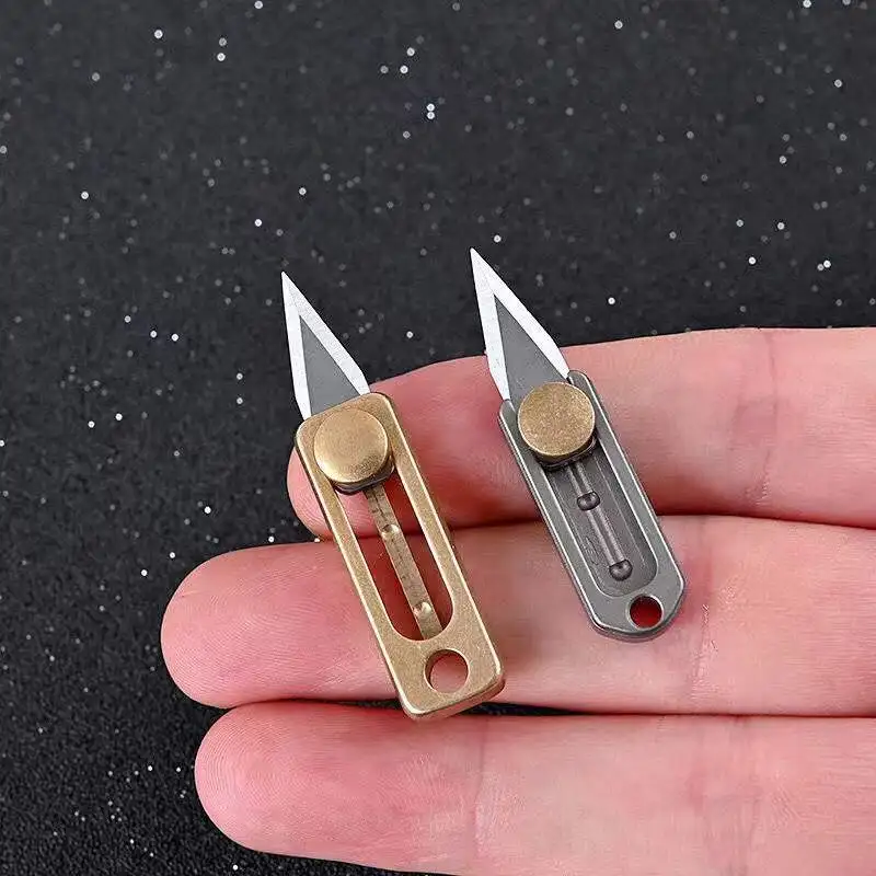 Mini Brass Titanium Alloy Push Knife Portable Unpacking And Unpacking Artifact
Mini Brass Titanium Alloy Push Knife Portable Unpacking And Unpacking Artifact
