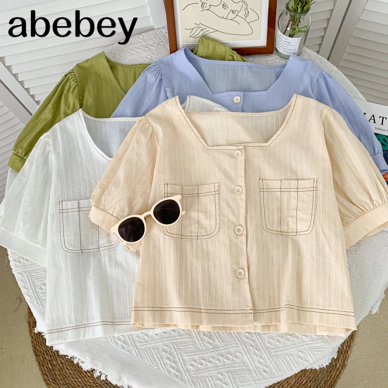 Korean square collar puff sleeve Shirt pocket decoration high waist single breasted short Shirt Top 2021 New Summer
Korean square collar puff sleeve Shirt pocket decoration high waist single breasted short Shirt Top 2021 New Summer