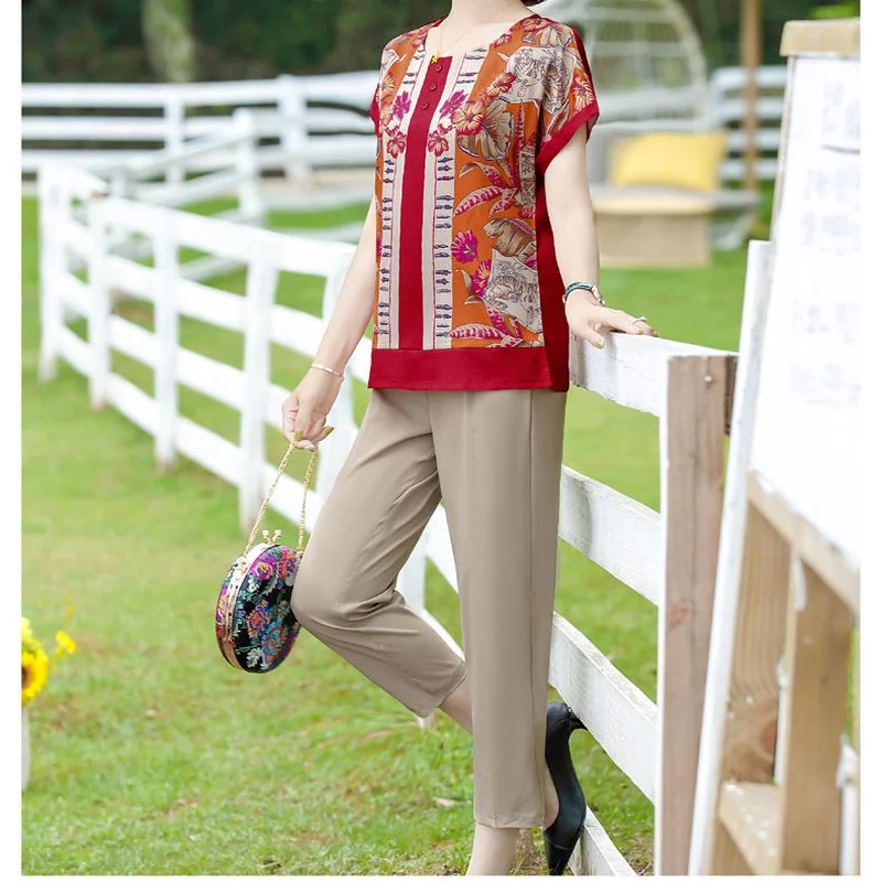 Женский спортивный костюм из двух предметов, футболка с коротким рукавом и брюки с принтом, повседневный модный спортивный костюм большого ...
Женский спортивный костюм из двух предметов, футболка с коротким рукавом и брюки с принтом, повседневный модный спортивный костюм большого ...