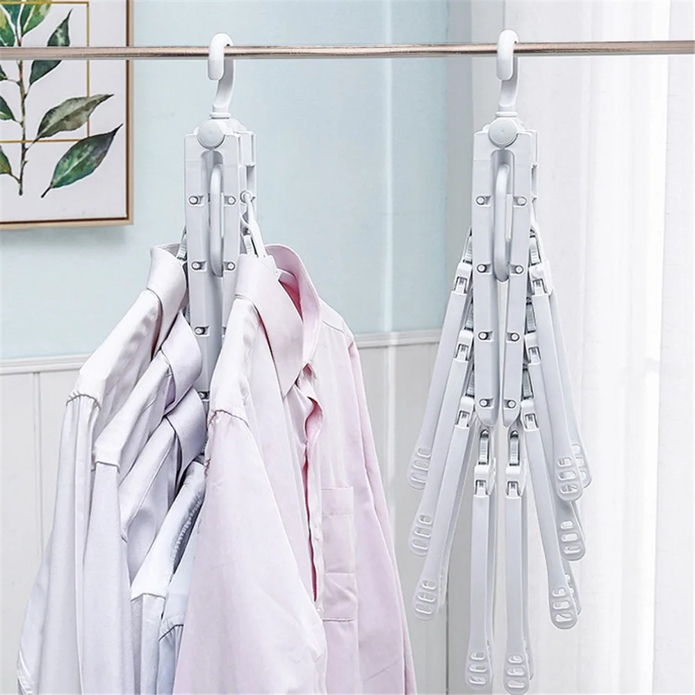 Rotate Anti-Skid Folding Hanger for Cloth Plastic Drying Hanging Rack for Towels Household Storage Space-saving Durable New 
Rotate Anti-Skid Folding Hanger for Cloth Plastic Drying Hanging Rack for Towels Household Storage Space-saving Durable New