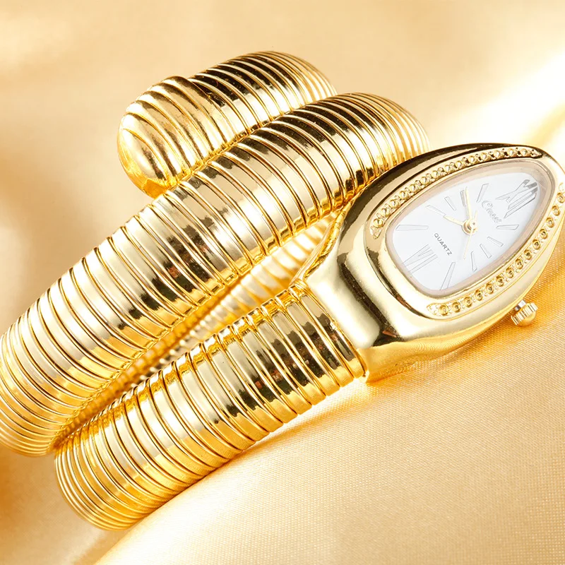 2021 Cussi Women Watch Luxury Gold Snake Winding Watches Women Fashion Quartz Bangle Bracelet Watches Ladies Watches Reloj Mujer
2021 Cussi Women Watch Luxury Gold Snake Winding Watches Women Fashion Quartz Bangle Bracelet Watches Ladies Watches Reloj Mujer
