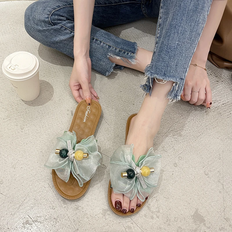 Summer New Fashion Women's Flip Flops Rhinestone Beaded Bow Flat Bottom Women's Slippers Soft Sole Women's Shoes Beach Shoes
Summer New Fashion Women's Flip Flops Rhinestone Beaded Bow Flat Bottom Women's Slippers Soft Sole Women's Shoes Beach Shoes