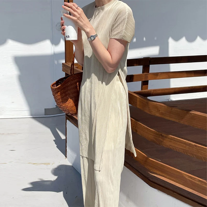 Casual Loose Pant Set Summer Korean Two Piece Set Women Short Sleeve Deep Split Top and High Waist Wide Leg Pant 2 Piece Outfits
Casual Loose Pant Set Summer Korean Two Piece Set Women Short Sleeve Deep Split Top and High Waist Wide Leg Pant 2 Piece Outfits