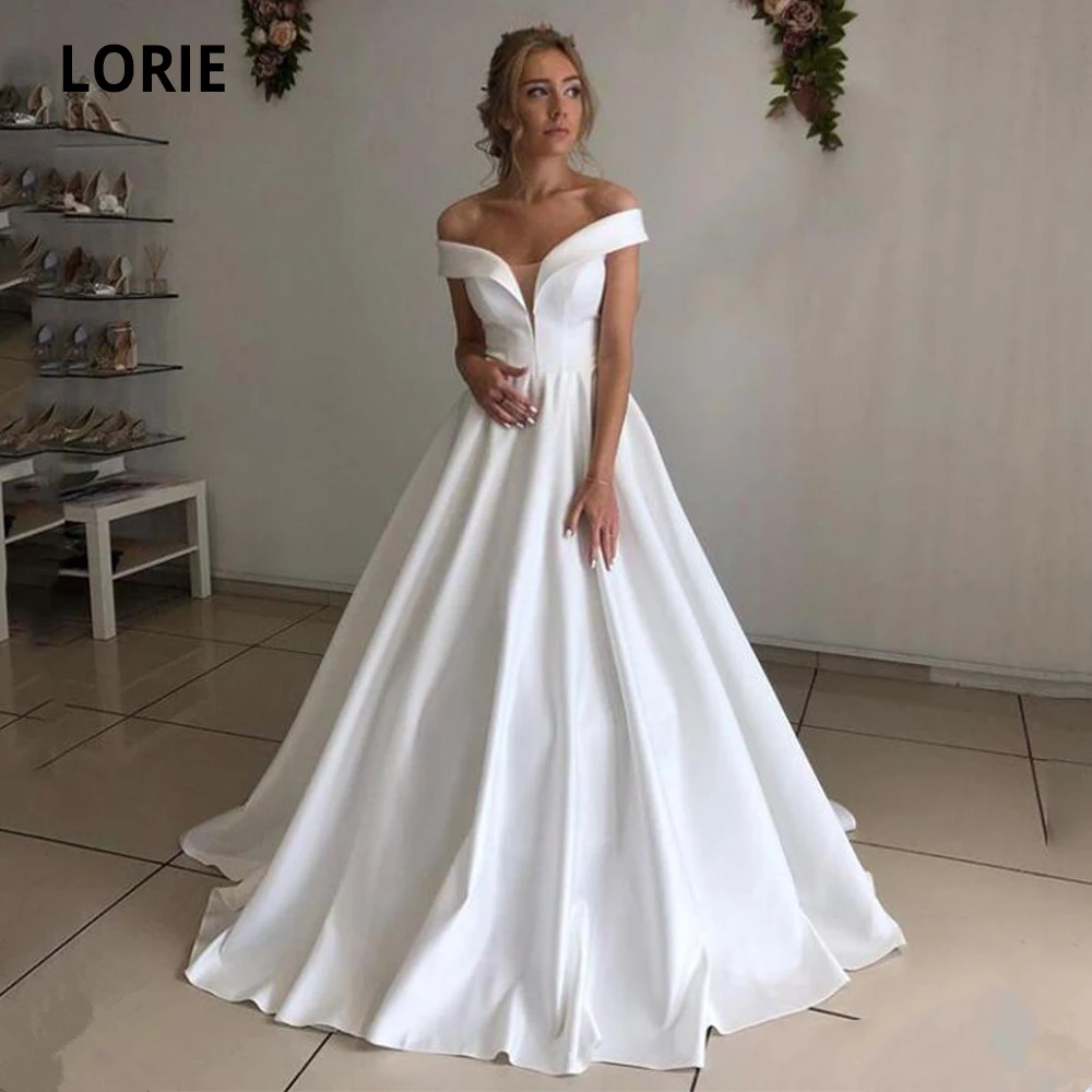 Атласные свадебные платья LORIE с открытыми плечами и V-образным вырезом, 2020, белые, цвета слоновой кости, свадебные платья на шнуровке сзади, трапециевидные пляжные вечерние платья принцессы
Атласные свадебные платья LORIE с открытыми плечами и V-образным вырезом, 2020, белые, цвета слоновой кости, свадебные платья на шнуровке сзади, трапециевидные пляжные вечерние платья принцессы