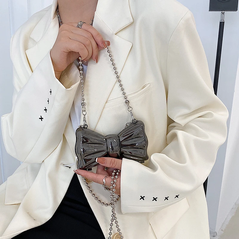 Bowknot Chains Shoulder Bag Niche Design 2021 Summer New Fashion Women's Mini Bag Crossbody Metallic Bag
Bowknot Chains Shoulder Bag Niche Design 2021 Summer New Fashion Women's Mini Bag Crossbody Metallic Bag