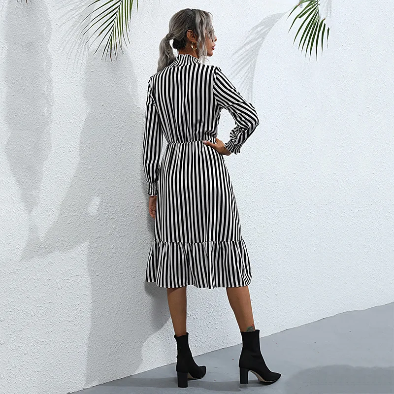 Spring new style of Europe and the United States long sleeve in long stripe half high collar wooden ear edge dress female 
Spring new style of Europe and the United States long sleeve in long stripe half high collar wooden ear edge dress female