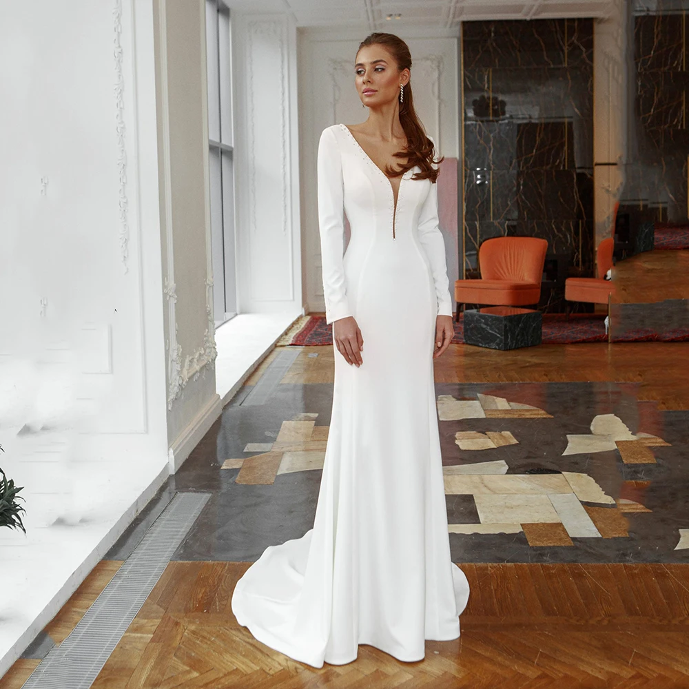 Simple V-Neck Mermaid Wedding Dresses 2021 Long Sleeves Backless Court Train Beading Bridal Gown Robe De Marie Stain Custom Made
Simple V-Neck Mermaid Wedding Dresses 2021 Long Sleeves Backless Court Train Beading Bridal Gown Robe De Marie Stain Custom Made