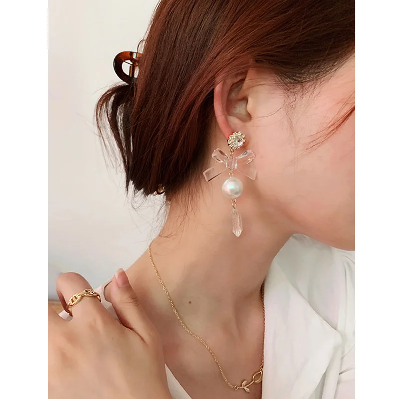 2021 new summer transparent acrylic ice cube earrings female fashion personality pearl earrings
2021 new summer transparent acrylic ice cube earrings female fashion personality pearl earrings