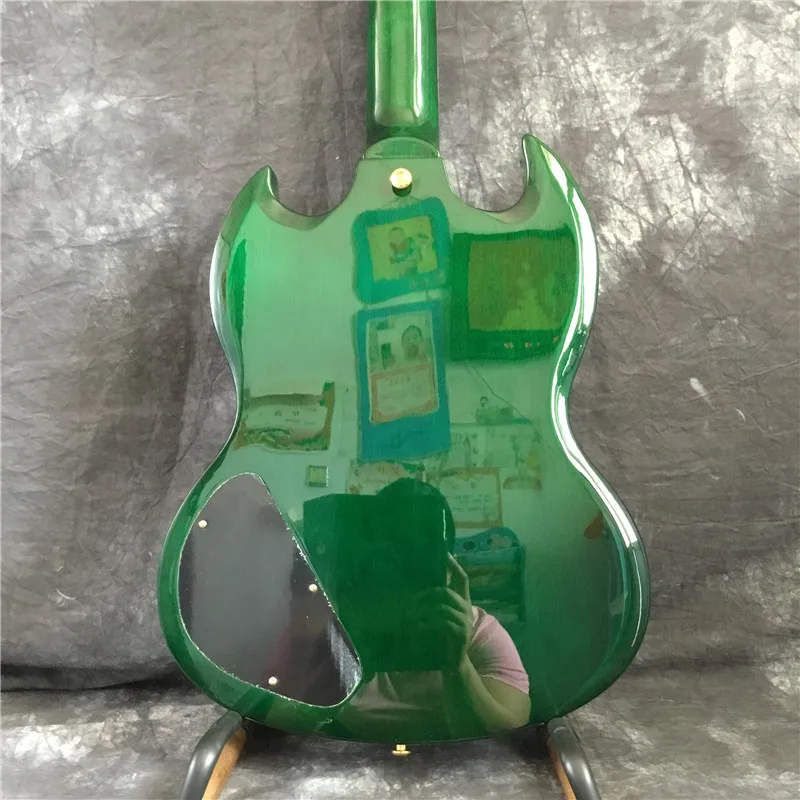Custom shop electric guitar green, fingerboard color shell inlay, rosewood fingerboard,
Custom shop electric guitar green, fingerboard color shell inlay, rosewood fingerboard,