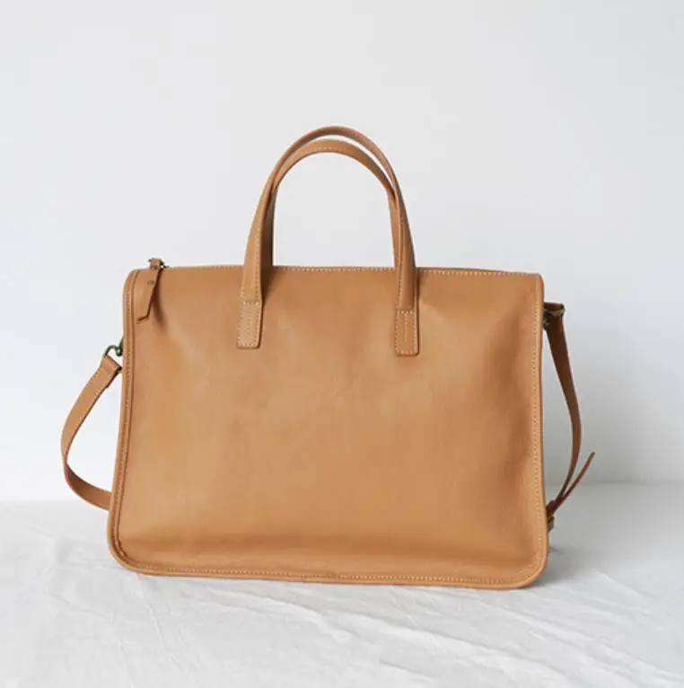 Briefcase ladies leather 2021 new business commuter fashion first layer coin-leather large volume simple lady handbag
Briefcase ladies leather 2021 new business commuter fashion first layer coin-leather large volume simple lady handbag