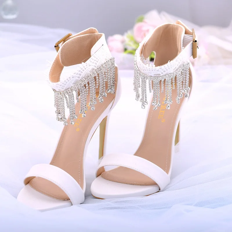 

Туфли женские свадебные на высоком каблуке-шпильке с пряжкой и кисточками