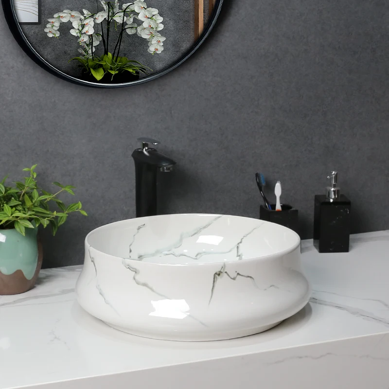 Скандинавская керамическая плитка с белым мраморным узором
Скандинавская керамическая плитка с белым мраморным узором