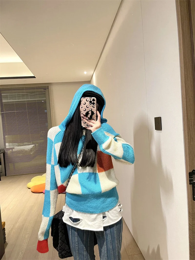 2021 Autumn new hooded knitted sweater fashion color matching plaid loose pullover sweaters
2021 Autumn new hooded knitted sweater fashion color matching plaid loose pullover sweaters