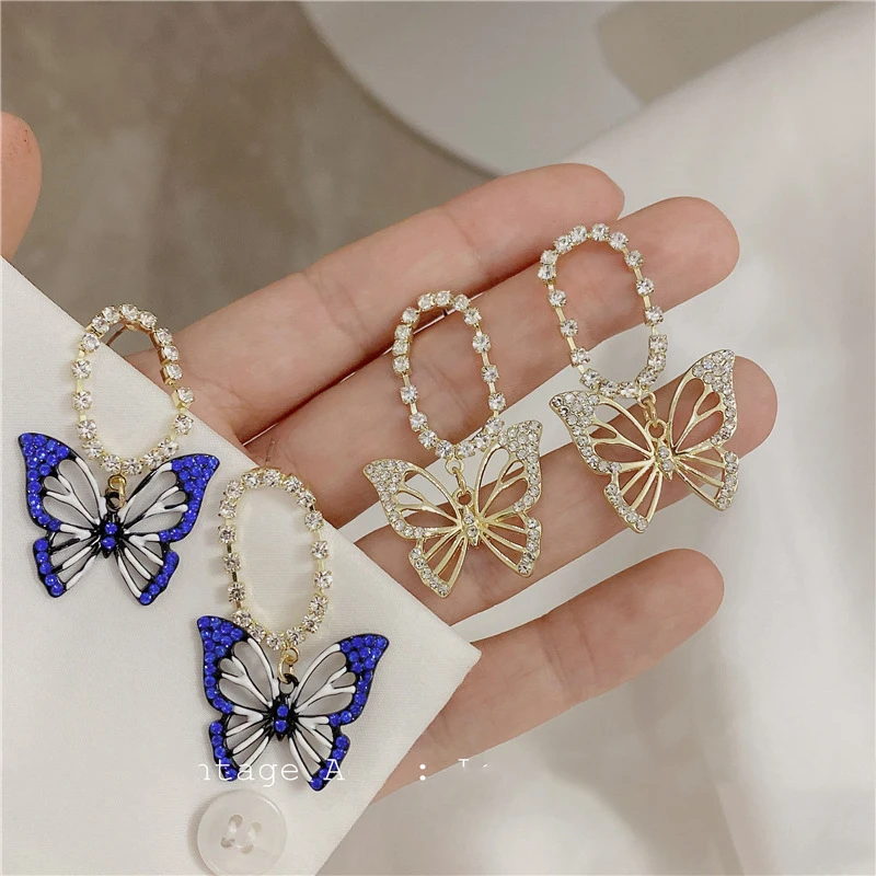 Origin Summer Fairy Bling Bling Butterfly Dangle Earring for Women Hollow Out Rhinestone White Blue Metallic Earring Jewellery
Origin Summer Fairy Bling Bling Butterfly Dangle Earring for Women Hollow Out Rhinestone White Blue Metallic Earring Jewellery