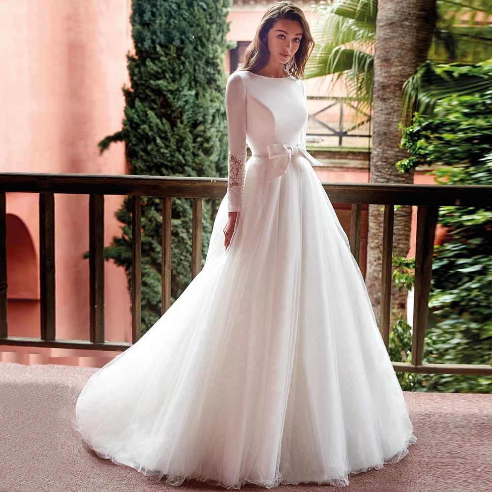 Gorgeous Lace Long Sleeve Court Train Wedding Dress 2021 Fashion O-Neck Bow Backless High Quality Tulle Bridal Gowns
Gorgeous Lace Long Sleeve Court Train Wedding Dress 2021 Fashion O-Neck Bow Backless High Quality Tulle Bridal Gowns