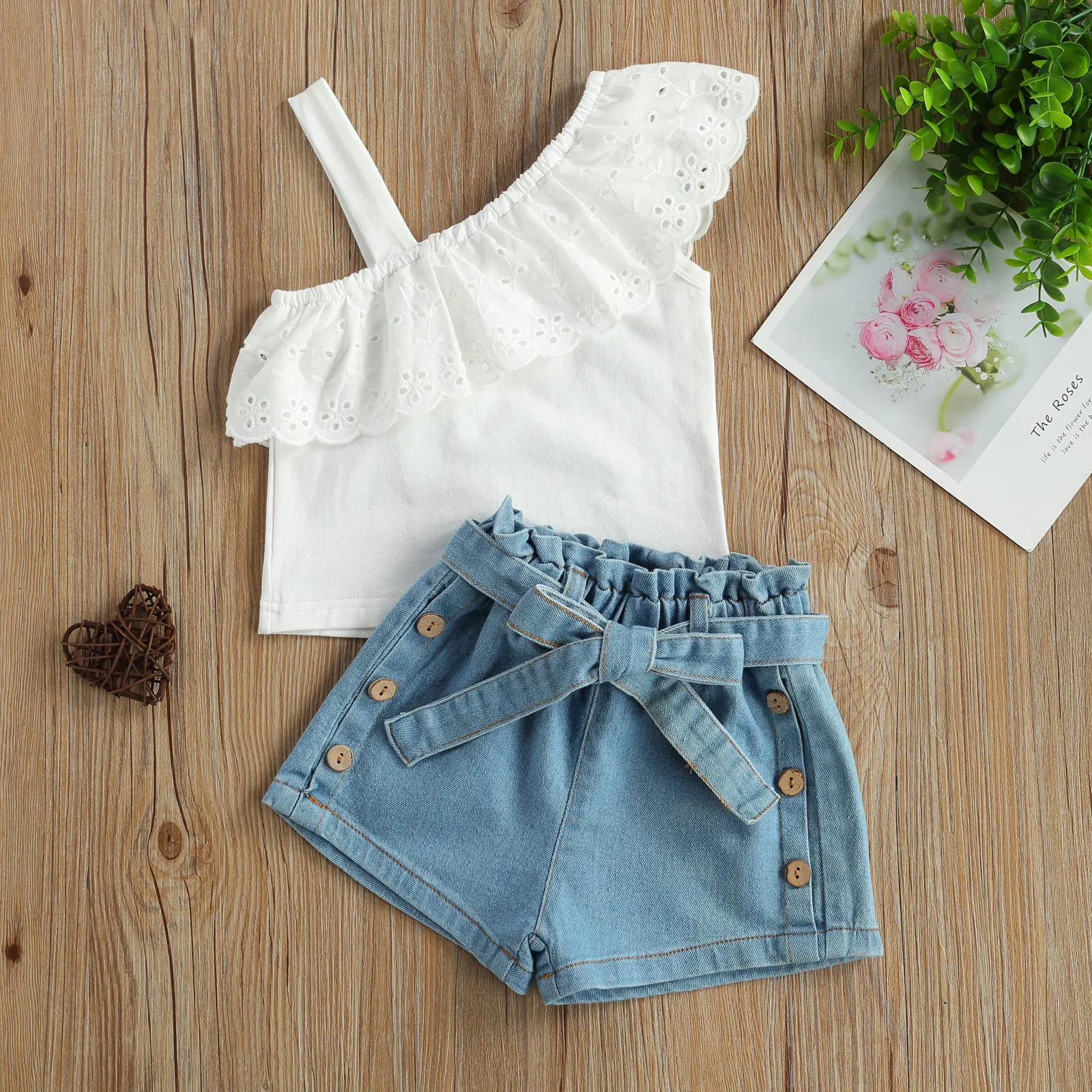 Fashion Kids Girls Clothes Sets Kids Strap One Shoulder Ruffle Tops+Belted Denim Shorts 2pcs Outfits Children Clothing for 2-6Y
Fashion Kids Girls Clothes Sets Kids Strap One Shoulder Ruffle Tops+Belted Denim Shorts 2pcs Outfits Children Clothing for 2-6Y