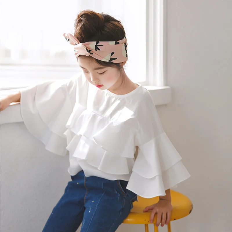2021 New Spring Cotton Ruffle White Teenage Kids Girls Blouses Shirts Baby Clothes School Autumn Summer Kids Fashion Tops
2021 New Spring Cotton Ruffle White Teenage Kids Girls Blouses Shirts Baby Clothes School Autumn Summer Kids Fashion Tops