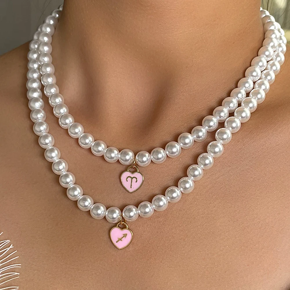 Elegant Pearls Choker 12 Constellation Pendant Necklace for Women Fashion Pink Heart Charm Pearl Chain Necklace Jewelry Gift 
Elegant Pearls Choker 12 Constellation Pendant Necklace for Women Fashion Pink Heart Charm Pearl Chain Necklace Jewelry Gift