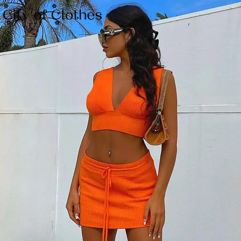 Orange Sexy Crop Tops Skirts 2-Pieces Sets Women V-Neck Halter Cropped Top and Mini Skirt Elastic Slim Beach Club Streetwear Set
Orange Sexy Crop Tops Skirts 2-Pieces Sets Women V-Neck Halter Cropped Top and Mini Skirt Elastic Slim Beach Club Streetwear Set