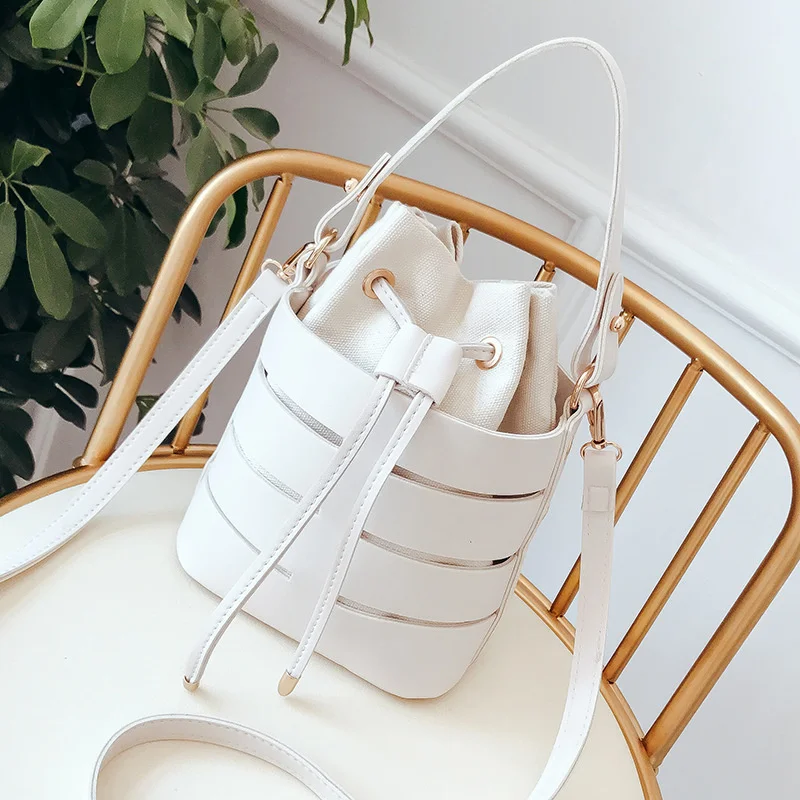 Fashion Drawstring PU Leather Bucket Bag For Women 2021 Lady Wild Small Solid Color Crossbody Bags Female Shoulder Handbags Tote
Fashion Drawstring PU Leather Bucket Bag For Women 2021 Lady Wild Small Solid Color Crossbody Bags Female Shoulder Handbags Tote