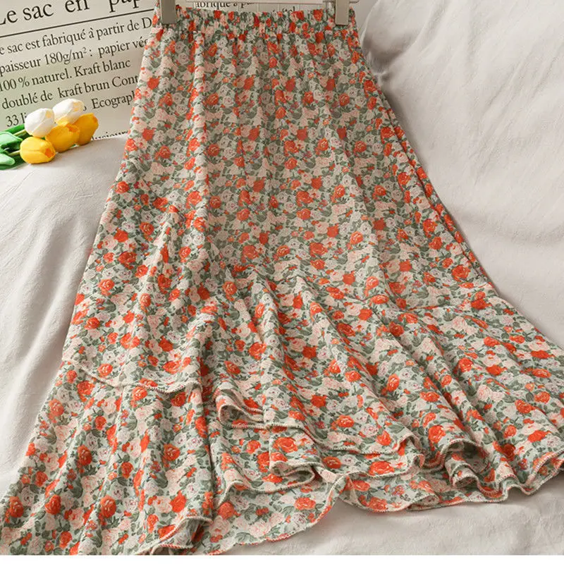 Medium-length chiffon skirt female summer spring summer new high-waisted a word small fresh broken flower irregular lotus lea 
Medium-length chiffon skirt female summer spring summer new high-waisted a word small fresh broken flower irregular lotus lea