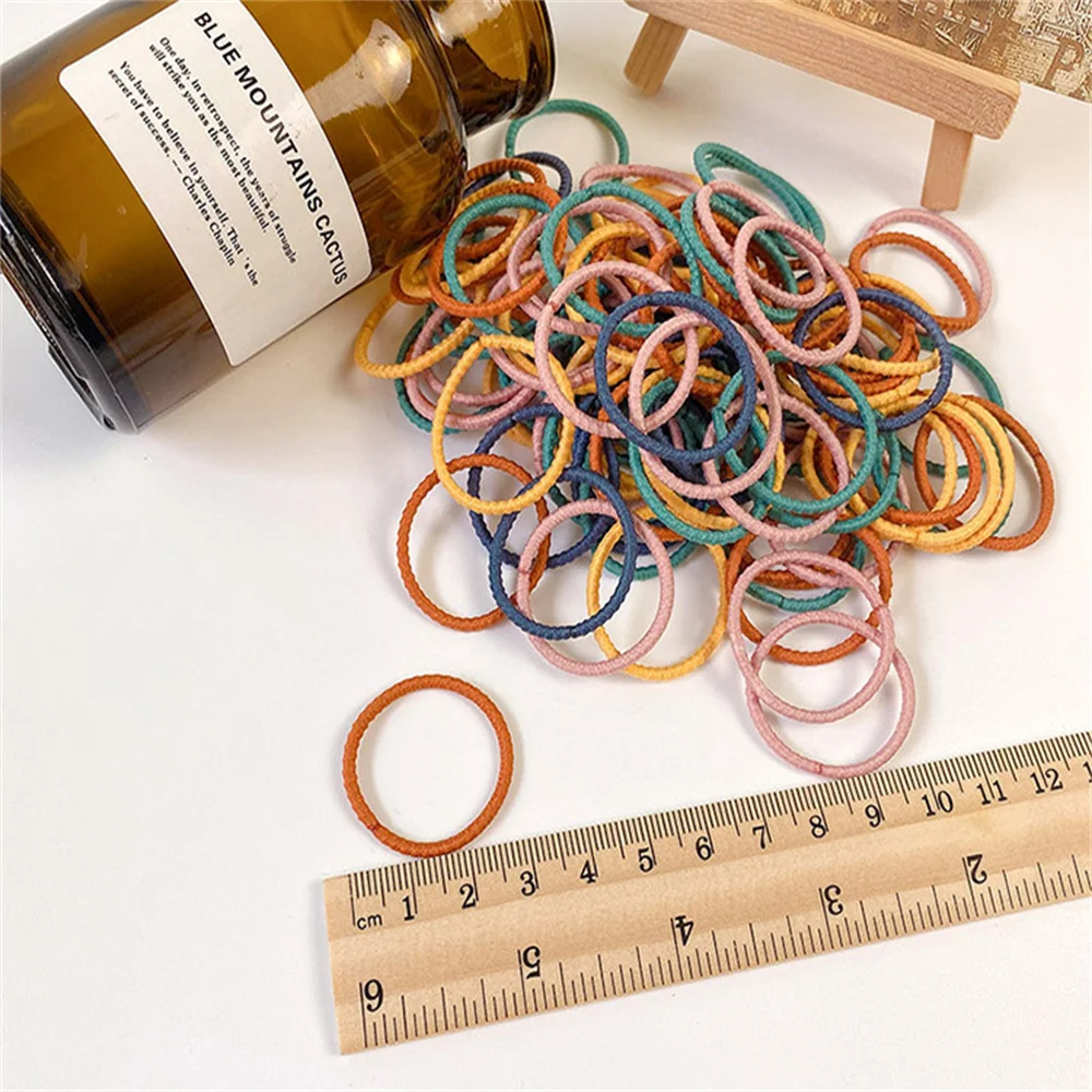 100pcs/set Girls Candy Color Hair Bands Girls Hair Accessories Elastic Rubber Band Hair Band Children Ponytail Holder Bands
100pcs/set Girls Candy Color Hair Bands Girls Hair Accessories Elastic Rubber Band Hair Band Children Ponytail Holder Bands