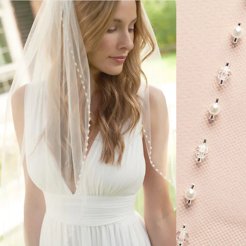 White/ Lvory 1 Tier Fingertip Wedding Veils Crystal Pearls Cut Edge Bridal Veil with Comb Bridal Accessories
White/ Lvory 1 Tier Fingertip Wedding Veils Crystal Pearls Cut Edge Bridal Veil with Comb Bridal Accessories