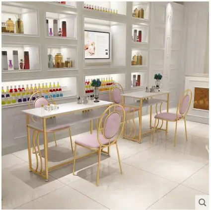 Simple and modern double solid wood manicure table and chair set single pair Nordic web celebrity new golden miniature manicure
Simple and modern double solid wood manicure table and chair set single pair Nordic web celebrity new golden miniature manicure