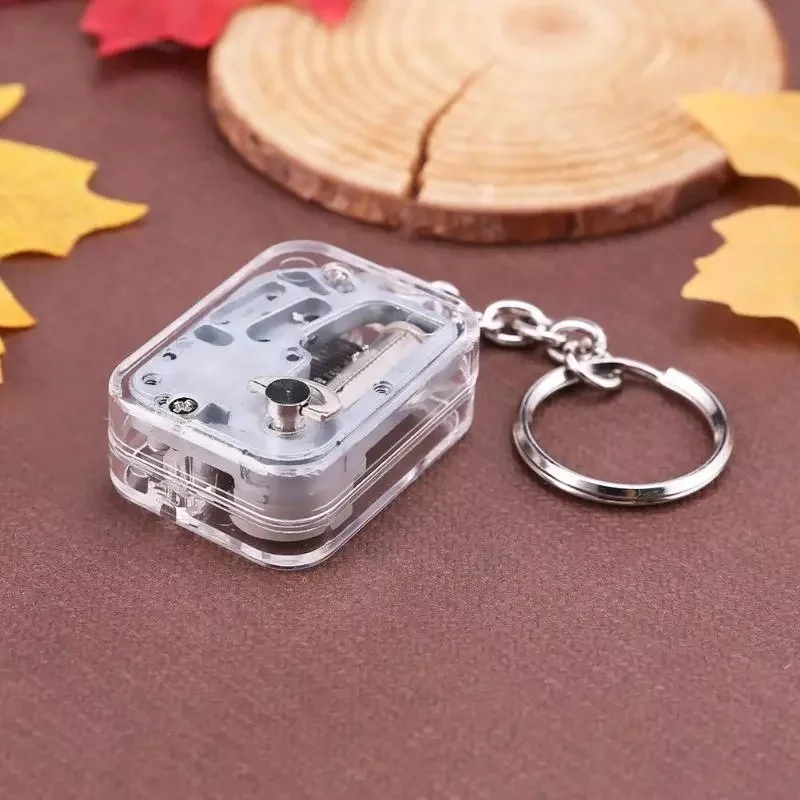 Transparent 18 Tones Music Box Keychain Portable Silver Metal Movement Nordic Style Accessories Navidad Ofertas Plastic Case
Transparent 18 Tones Music Box Keychain Portable Silver Metal Movement Nordic Style Accessories Navidad Ofertas Plastic Case