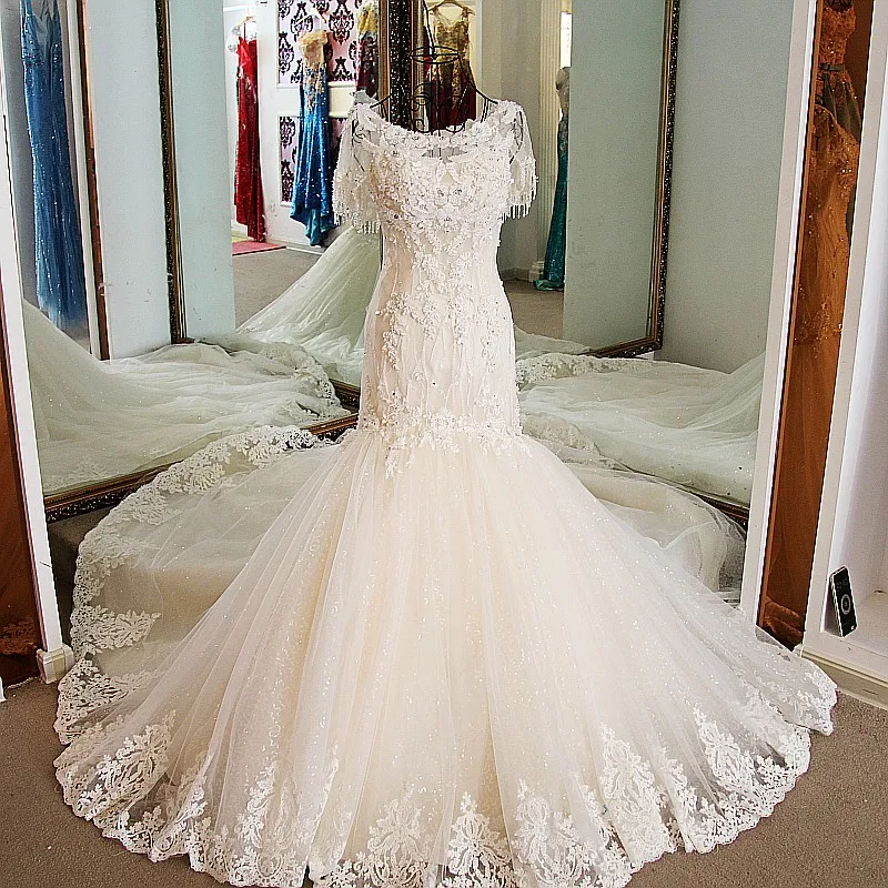 Mermaid Long Wedding Dress 2021 Short Sleeves Appliques Shinny Tulle Vestidos De Novias Lace up Bridal Gowns Sweep Train Dresses
Mermaid Long Wedding Dress 2021 Short Sleeves Appliques Shinny Tulle Vestidos De Novias Lace up Bridal Gowns Sweep Train Dresses