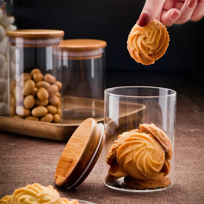 High Borosilicate Glass Sealed Storage Tank with Bamboo Cover Round Food Coffee Tea Cans Kitchen Cereal Snack Storage Bottle 
High Borosilicate Glass Sealed Storage Tank with Bamboo Cover Round Food Coffee Tea Cans Kitchen Cereal Snack Storage Bottle
