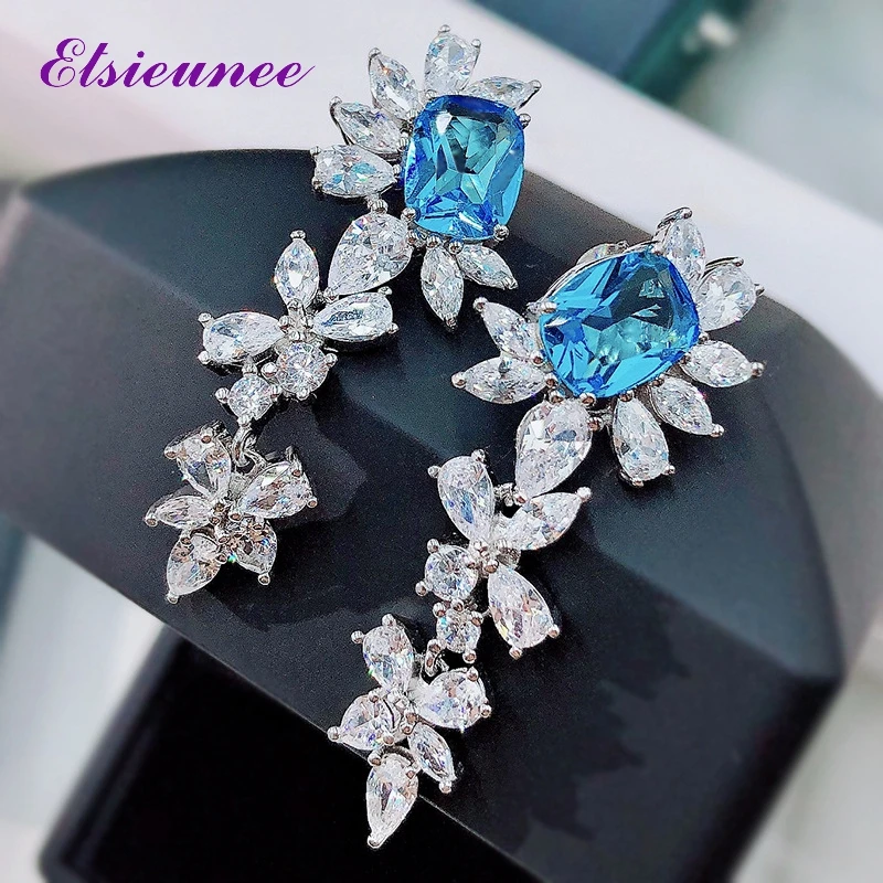 ELSIEUNEE 925 Sterling Silver Sapphire Aquamarine Created Moissanite Gemstone Wedding Dangle Drop Earrings Ladies Fine Jewelry
ELSIEUNEE 925 Sterling Silver Sapphire Aquamarine Created Moissanite Gemstone Wedding Dangle Drop Earrings Ladies Fine Jewelry