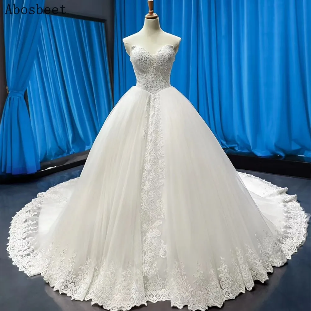 Elegant Ball Gown White Wedding Dress 2021 Long Train Beading Top Puffy Gown Lace Eade Women Wedding Gown Bridal Sweetheart
Elegant Ball Gown White Wedding Dress 2021 Long Train Beading Top Puffy Gown Lace Eade Women Wedding Gown Bridal Sweetheart