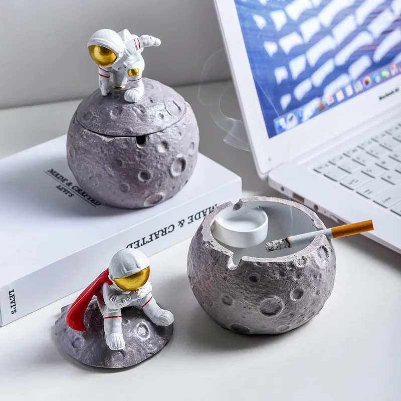 Cartoon creative astronaut ashtray home decoration small planet lonely moon ornaments
Cartoon creative astronaut ashtray home decoration small planet lonely moon ornaments