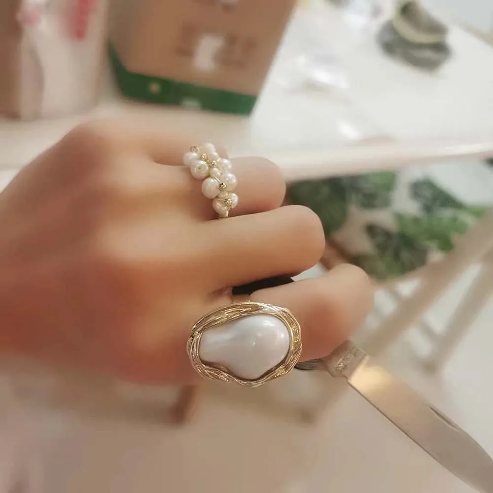 Light luxury retro niche design sense pearl ring women girls ins tide fashion index finger ring cold wind open ring gift jewelry
Light luxury retro niche design sense pearl ring women girls ins tide fashion index finger ring cold wind open ring gift jewelry